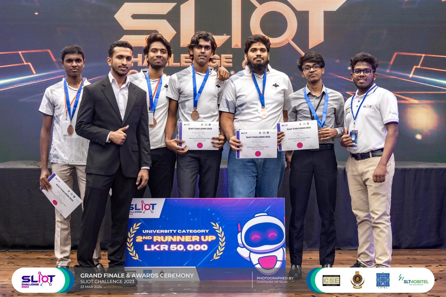 Team Hades receiving the 2nd Runner-up award on stage